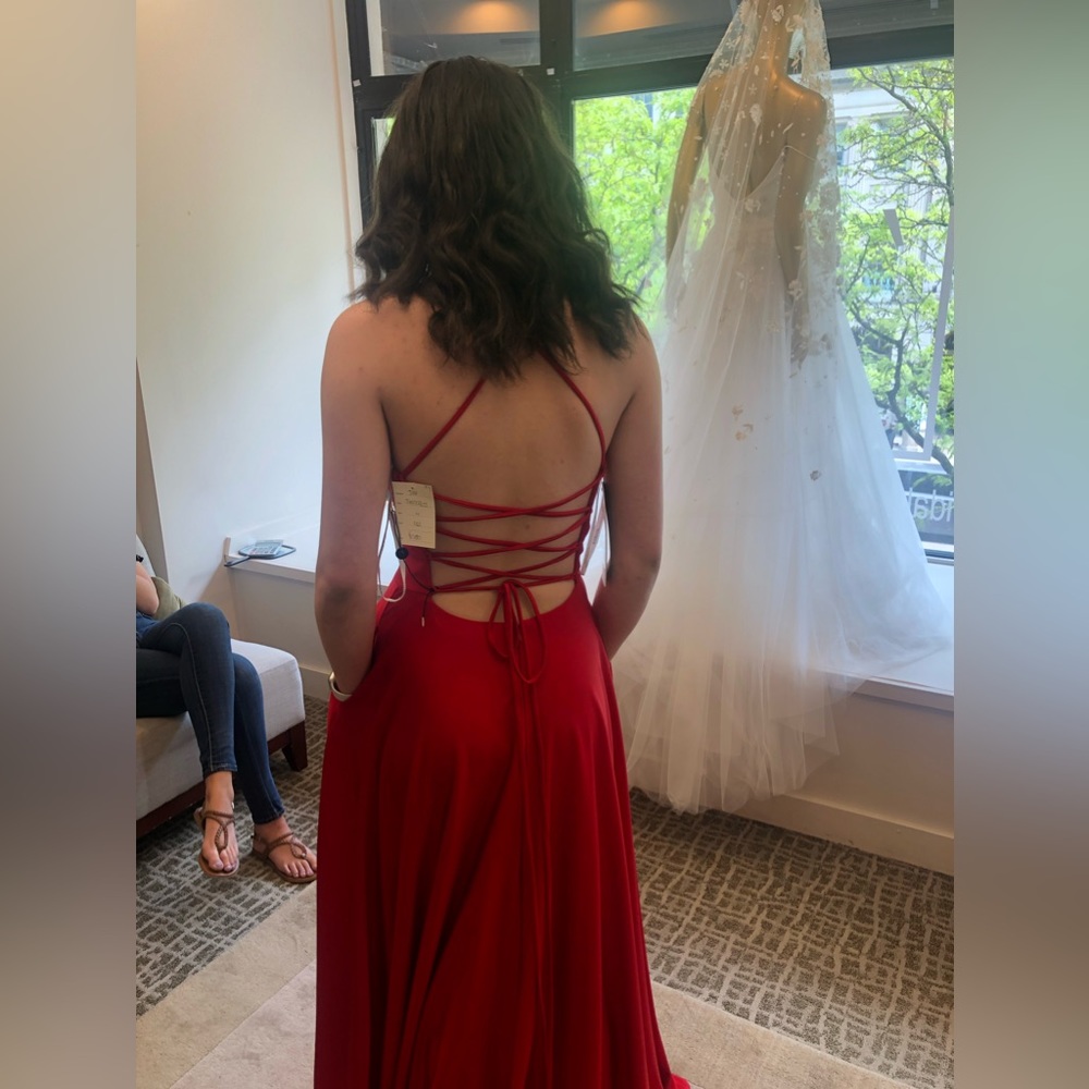 Such a beautiful bright red prom dress.